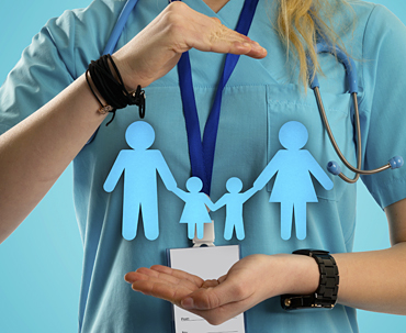 Abstract image of a nurse protecting a graphic icon shaped family.